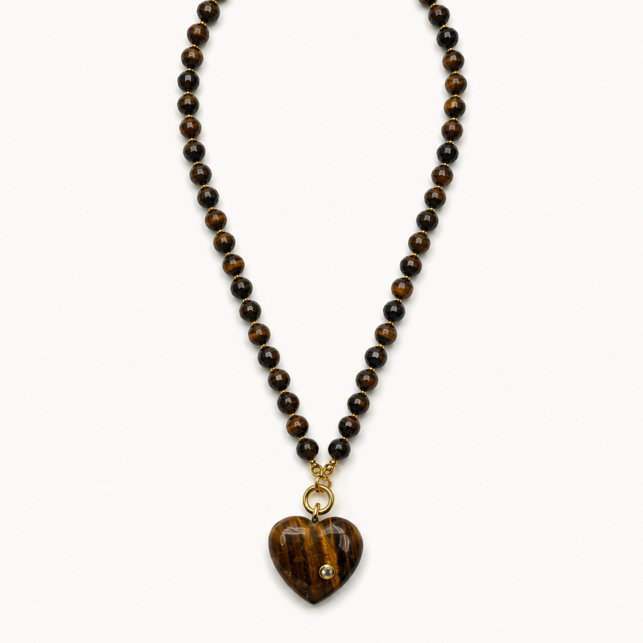 Pendant-focused brown faceted bead necklace with striped heart pendant — SKU IZZ193