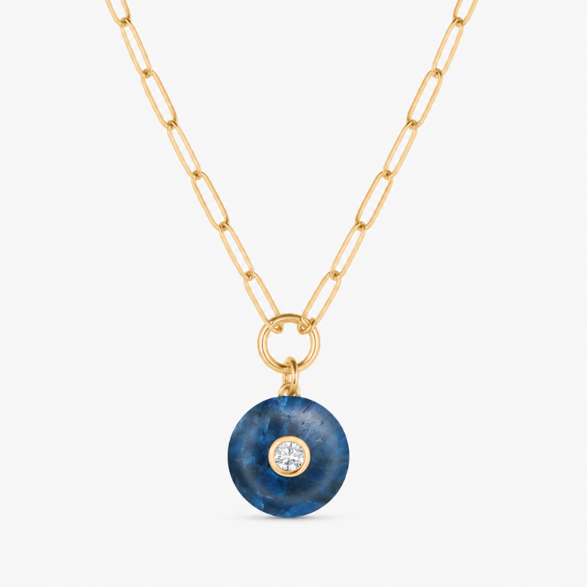 apatite smooth round charm shown on a gold paperclip charm necklace