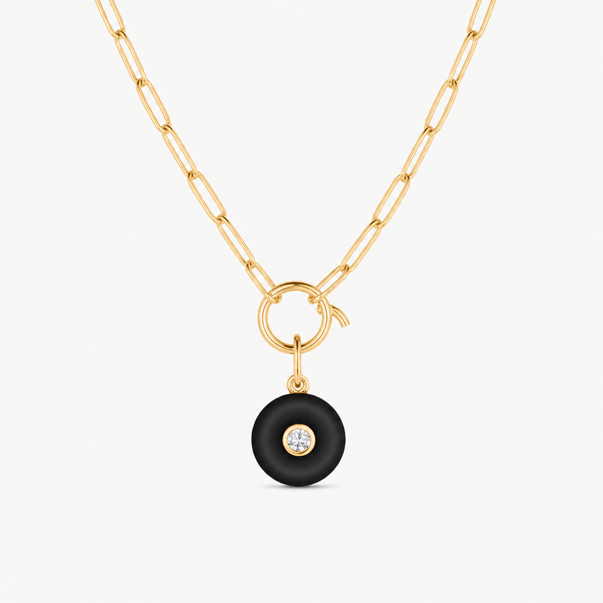 black onyx smooth round charm shown on a gold paperclip charm necklace