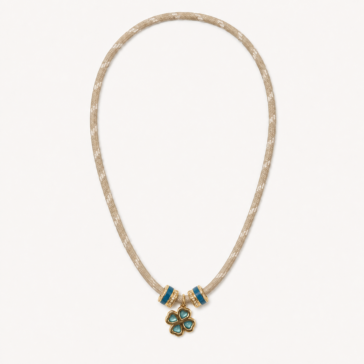 Cream cord necklace with turquoise clover pendant and centered spacer rings