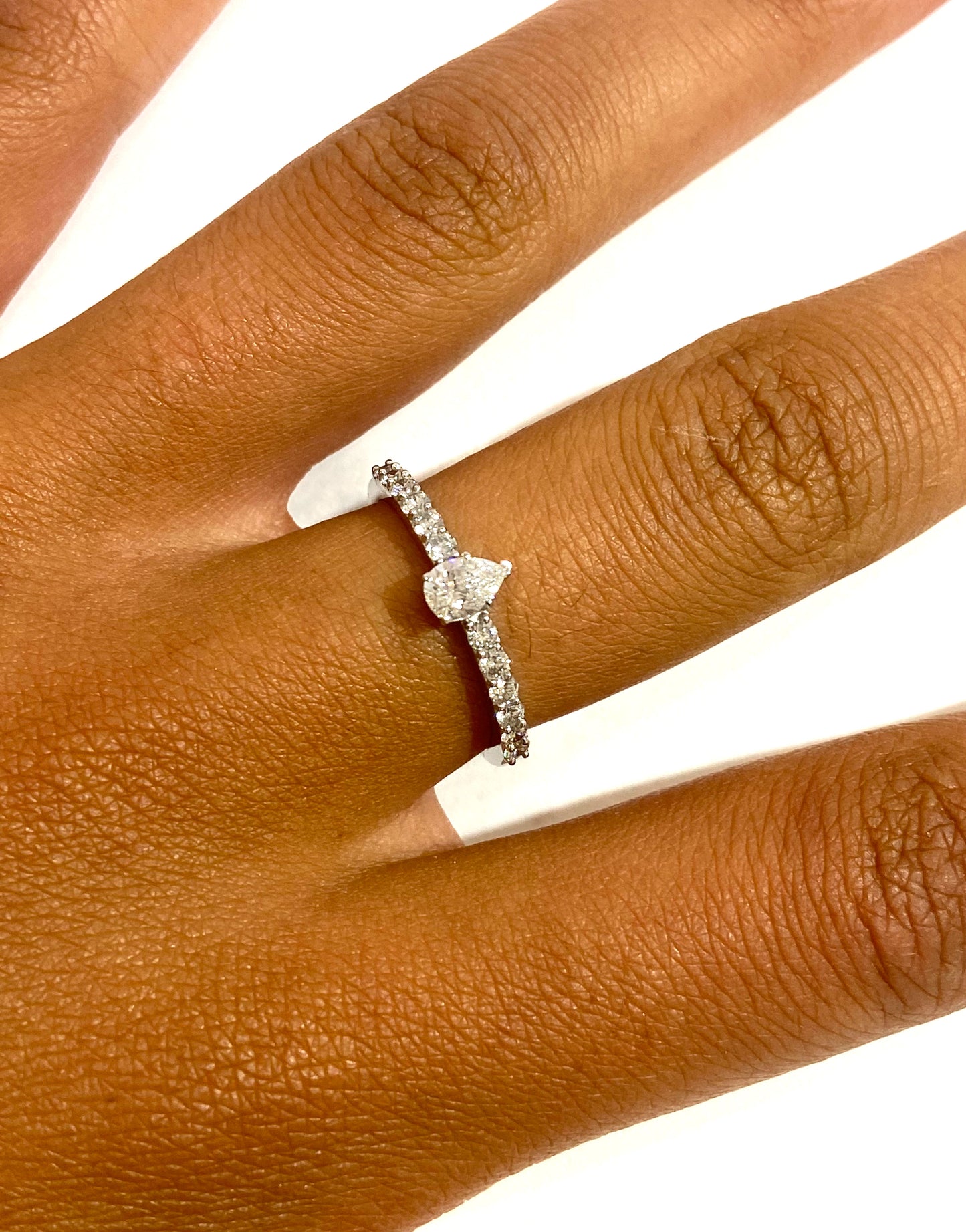 Diamond Band with Pear Shape Center Ring