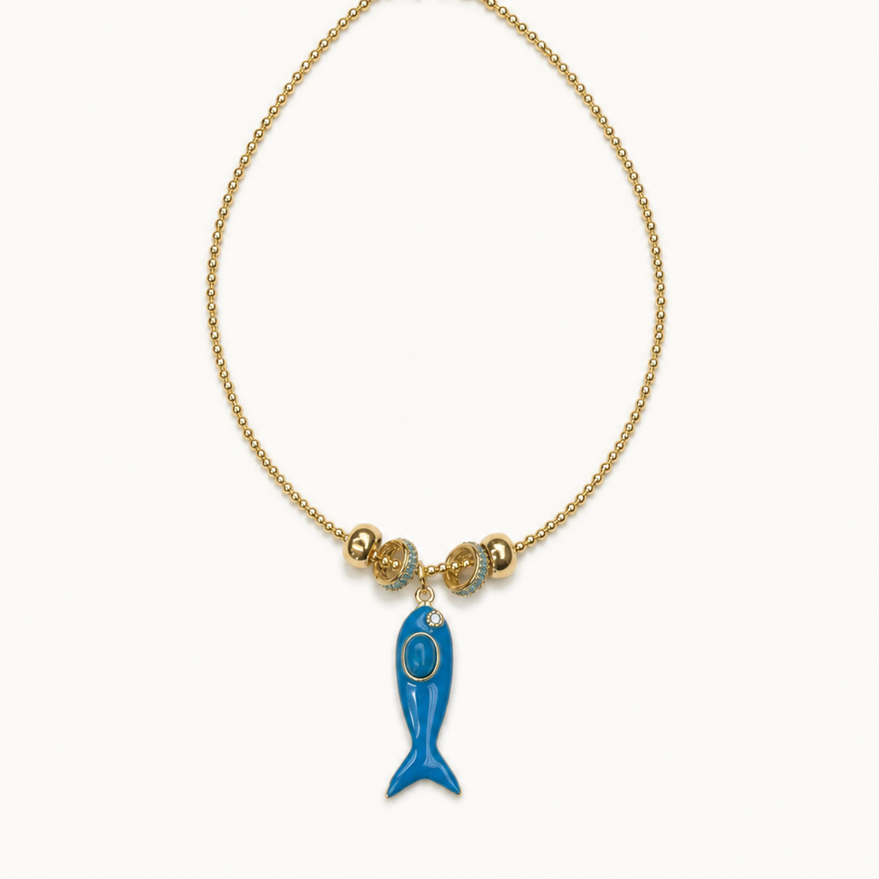 Pendant-focused gold-tone beaded choker with blue fish pendant — SKU MRD041