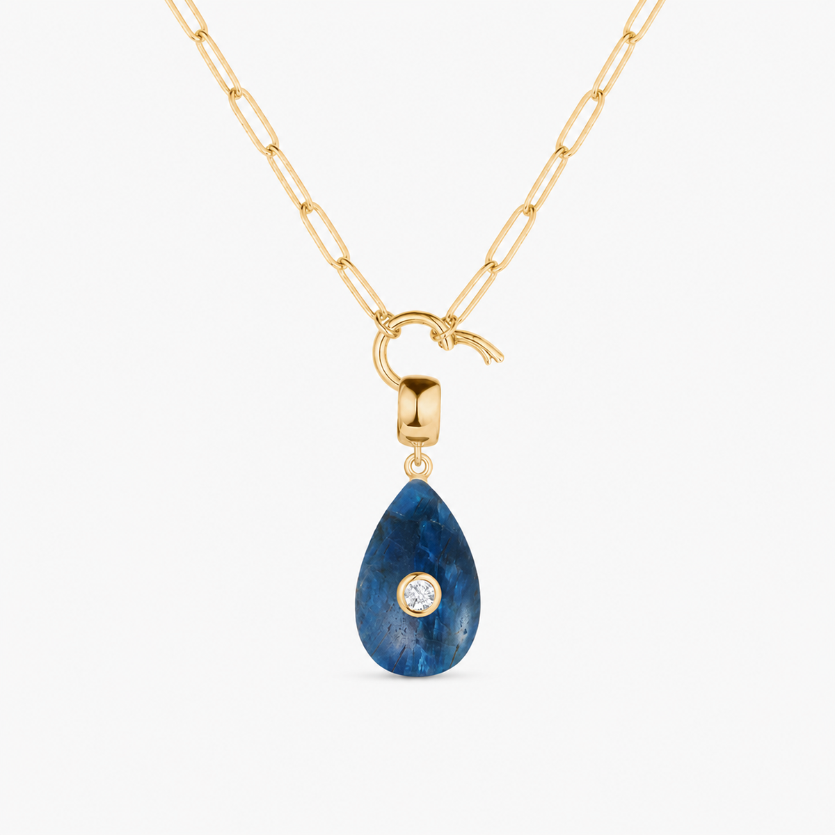 apatite smooth teardrop charm shown on a gold paperclip charm necklace