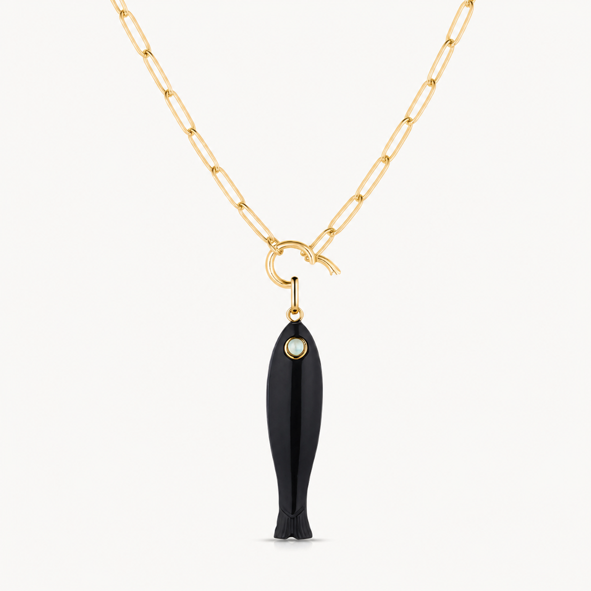 black onyx fish charm shown on a gold paperclip charm necklace