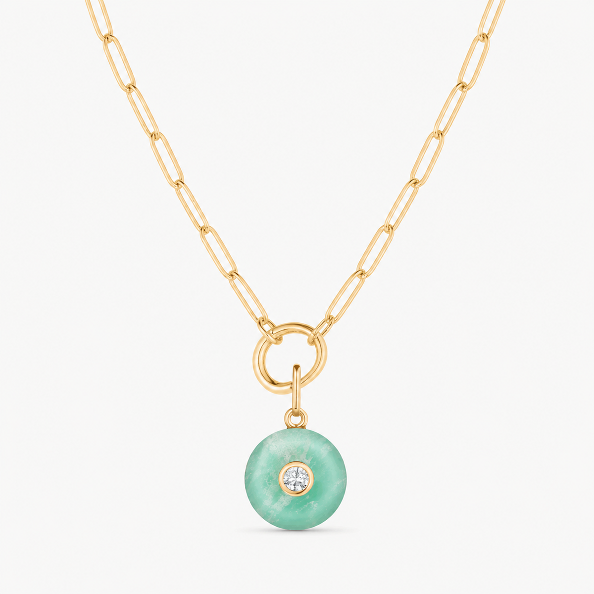 chrysoprase smooth round charm shown on a gold paperclip charm necklace