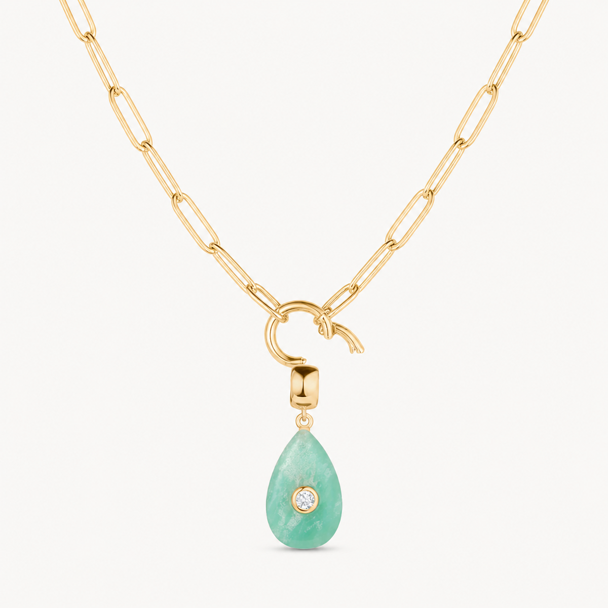 chrysoprase smooth teardrop charm shown on a gold paperclip charm necklace