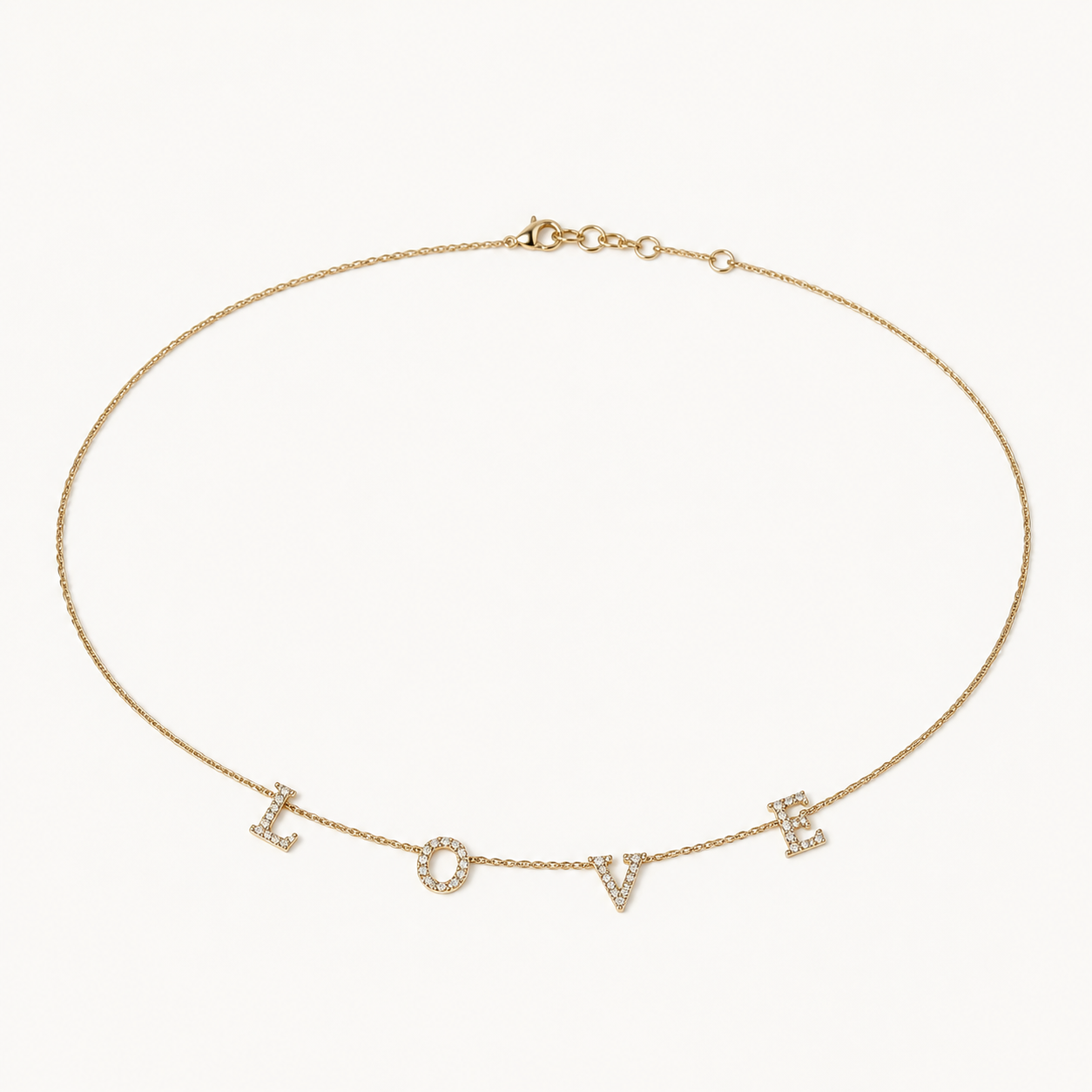 14K diamond LOVE letter necklace arranged in an oval