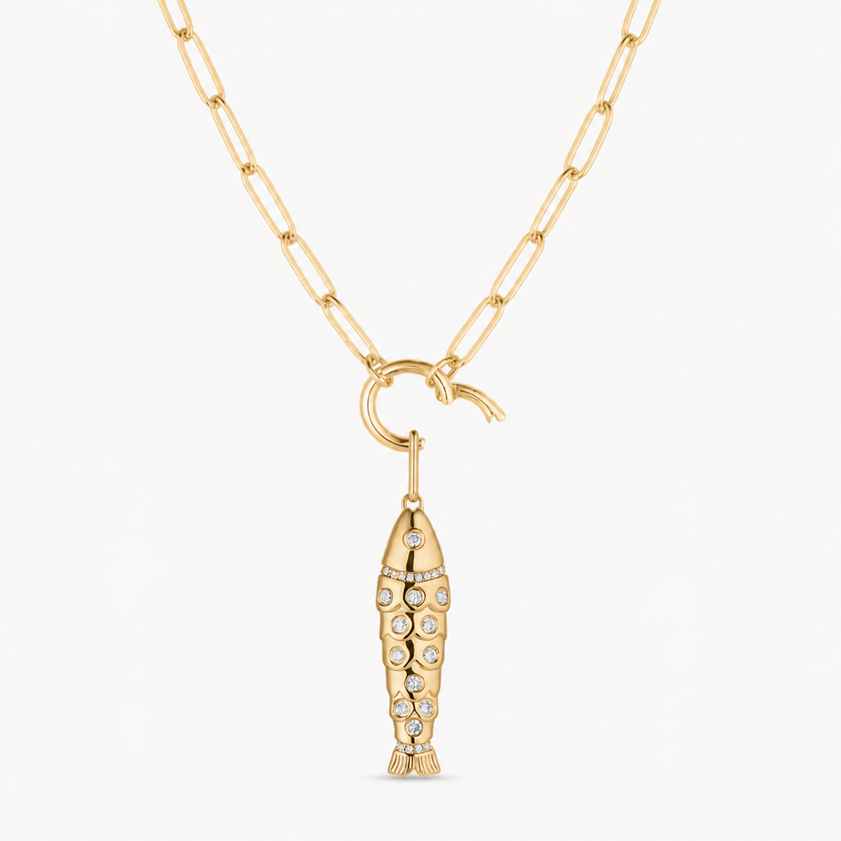 gold & cubic zirconia fish charm shown on a gold paperclip charm necklace