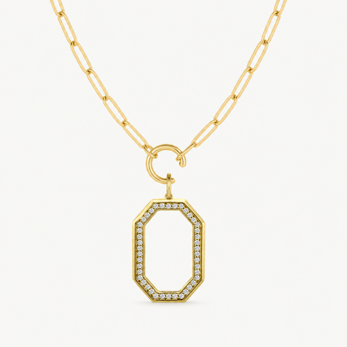 gold and diamond oval octagon charm shown on a gold paperclip charm necklace