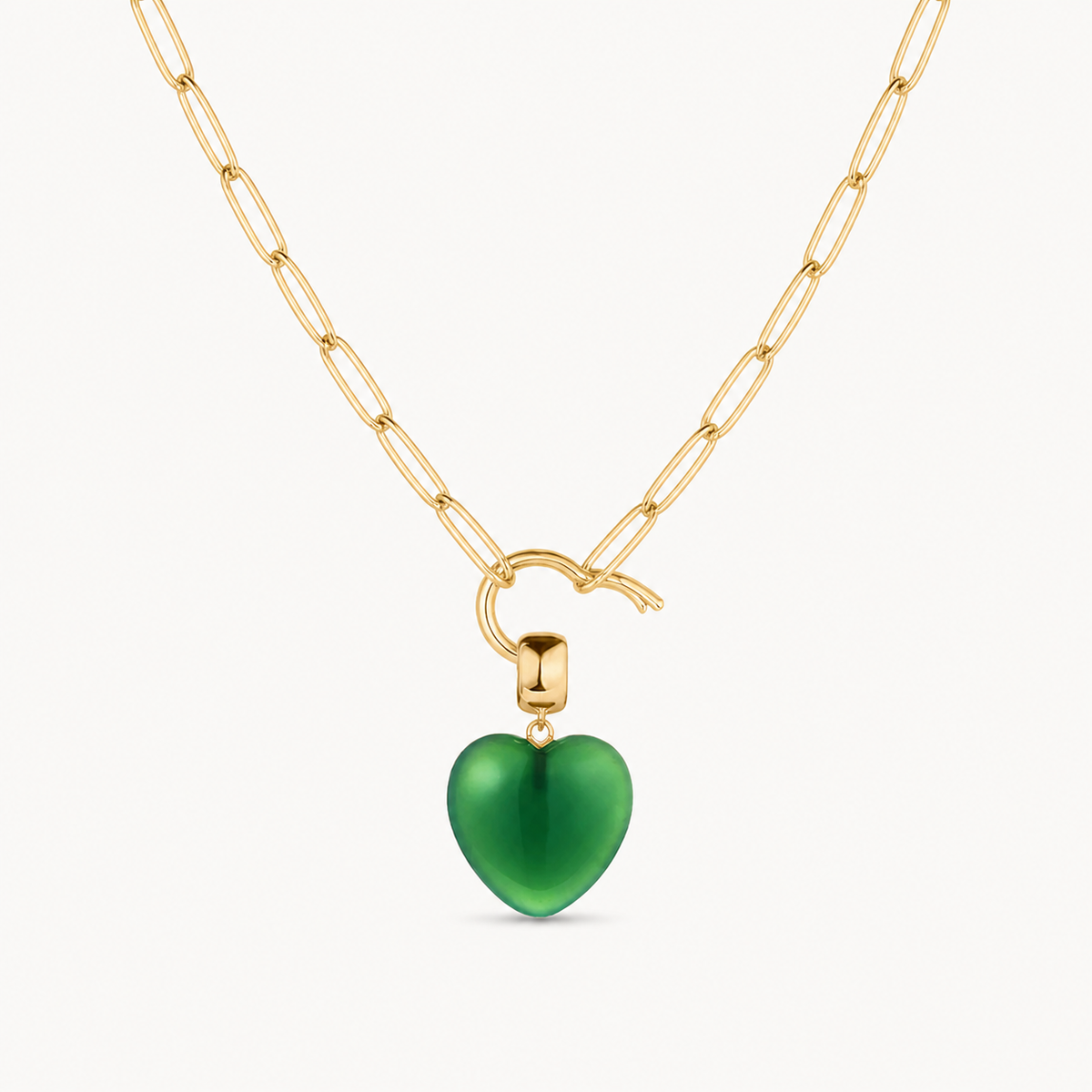 green jade small smooth heart charm shown on a gold paperclip charm necklace