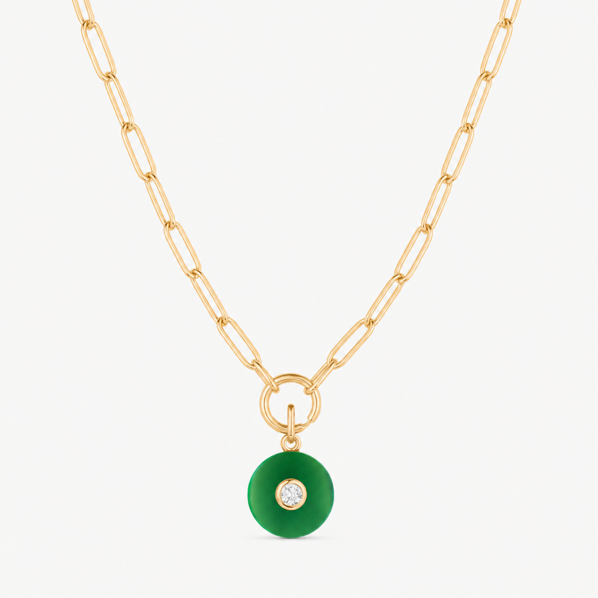 green jade smooth round charm shown on a gold paperclip charm necklace