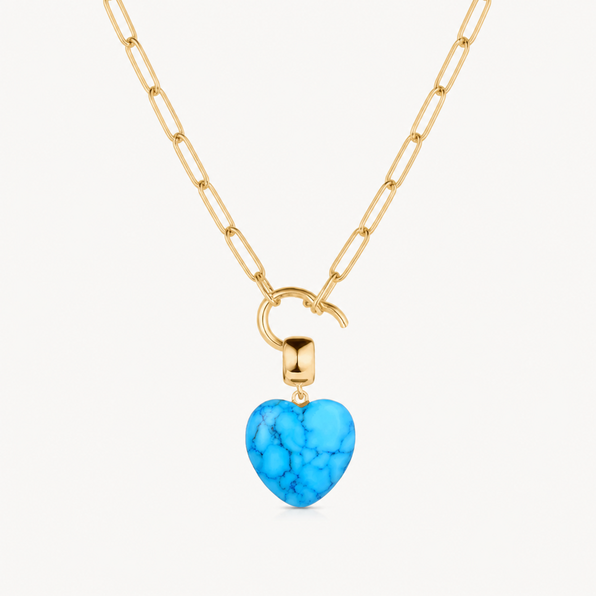howlite small smooth heart charm shown on a gold paperclip charm necklace