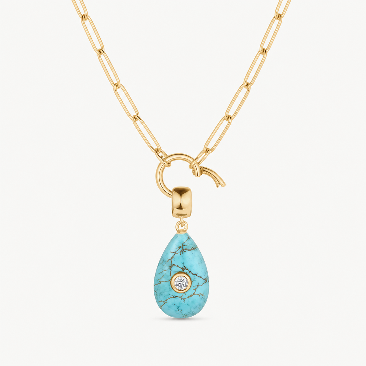 howlite smooth teardrop charm shown on a gold paperclip charm necklace