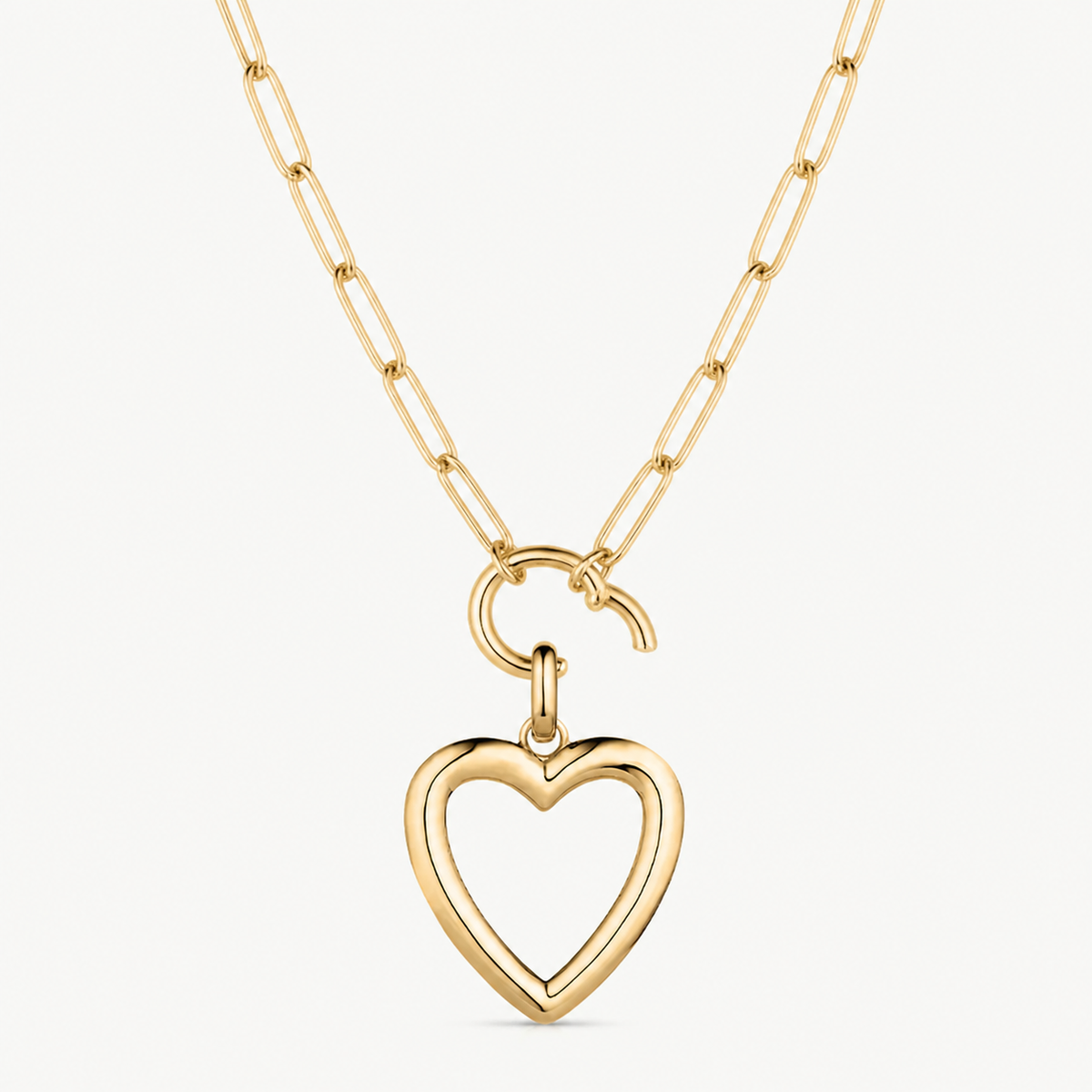 open heart clip charm shown on a gold paperclip charm necklace