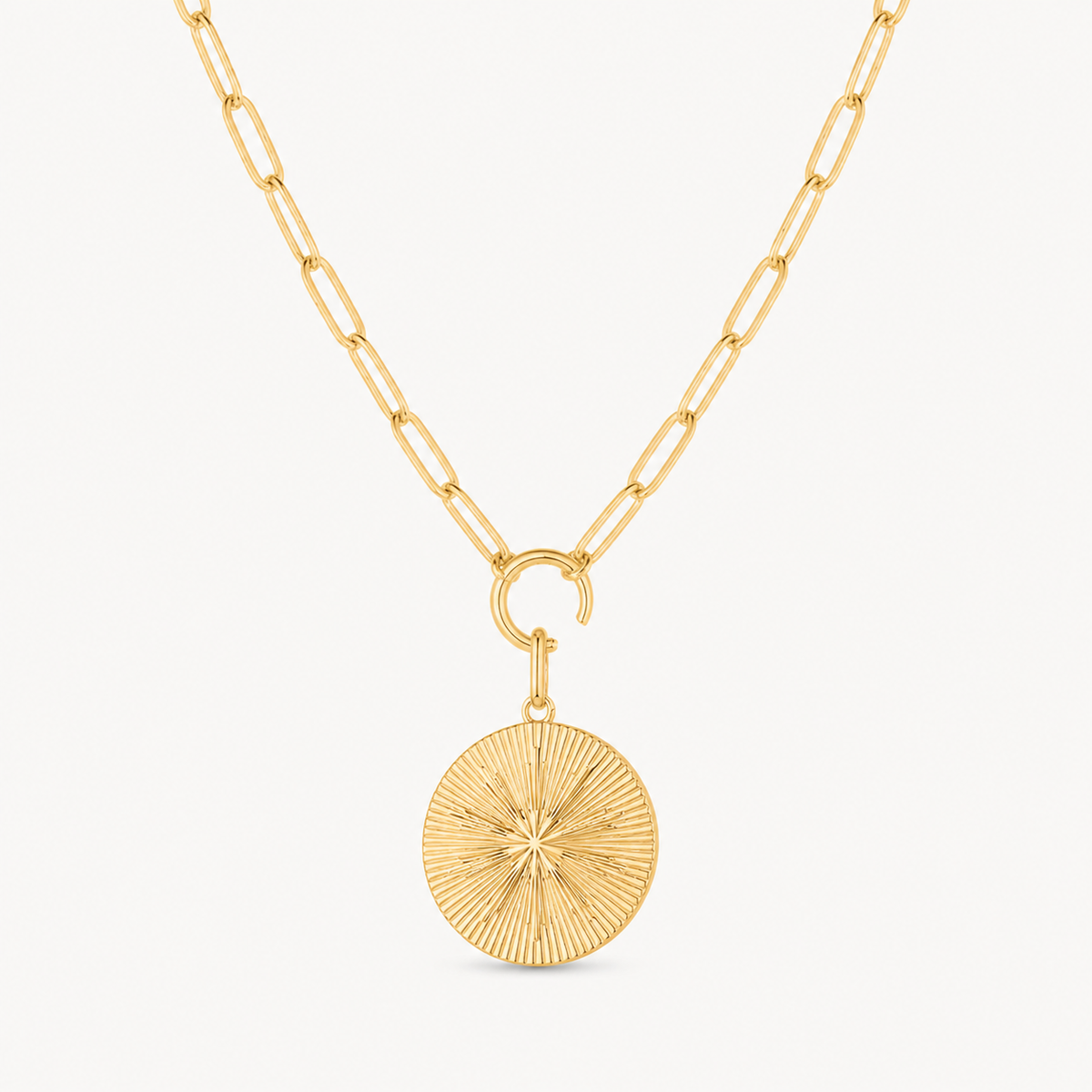 sundial coin round charm shown on a gold paperclip charm necklace
