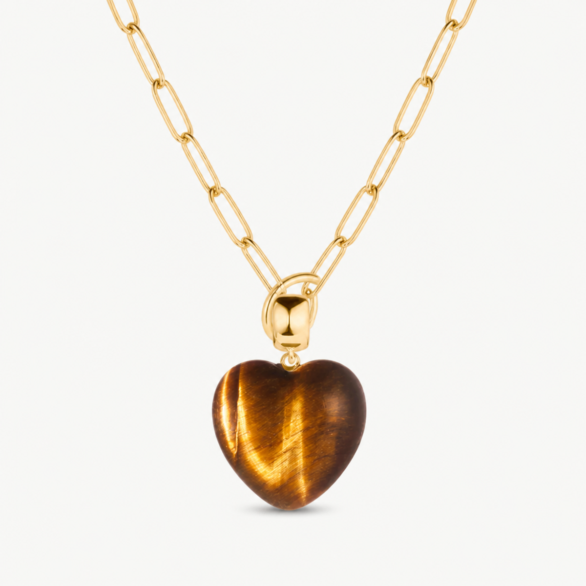 tiger eye small smooth heart charm shown on a gold paperclip charm necklace