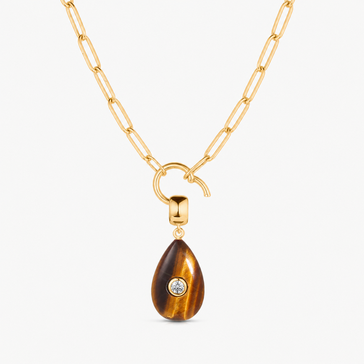 tiger eye smooth teardrop charm shown on a gold paperclip charm necklace